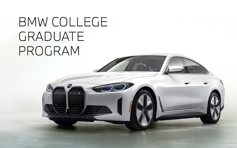 White BMW i4 parked. BMW College Graduate Program. | BMW of Tallahassee in Tallahassee FL