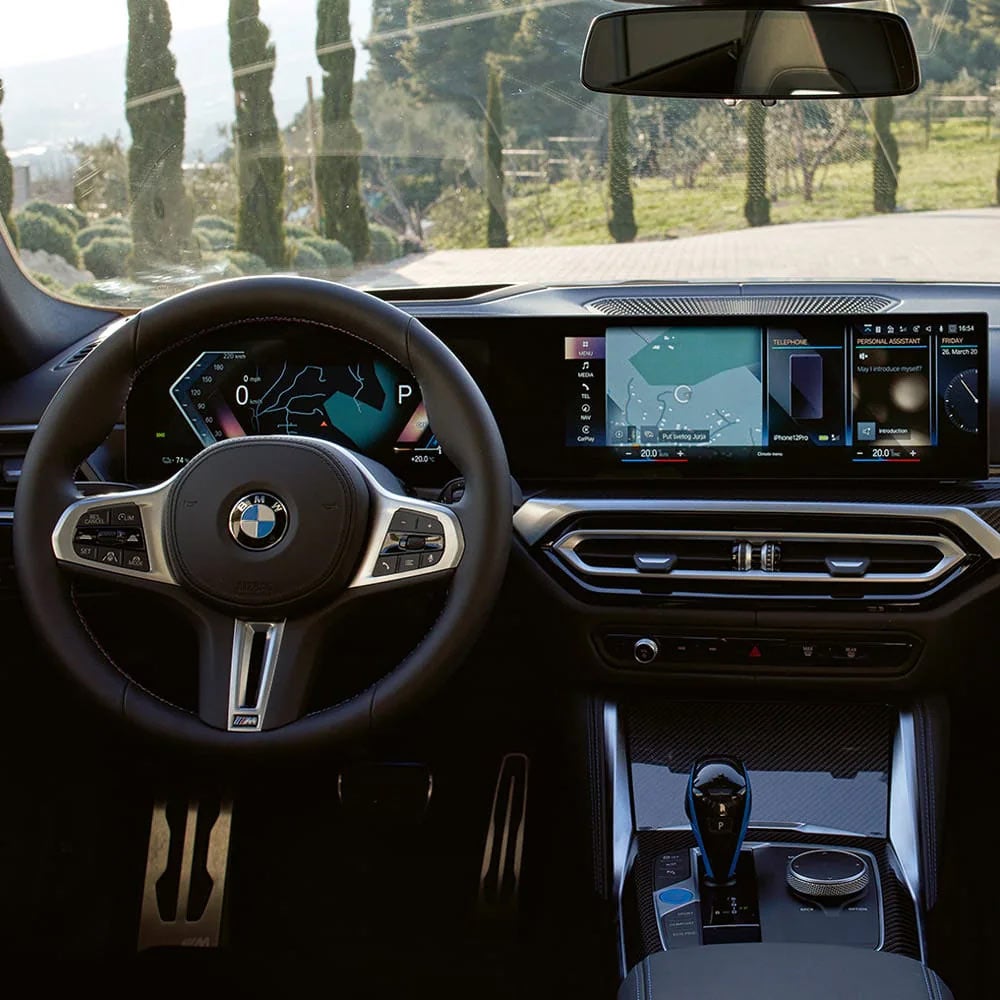 A driver's eye view of steering wheel and controls of the BMW i4 | BMW of Tallahassee in Tallahassee FL